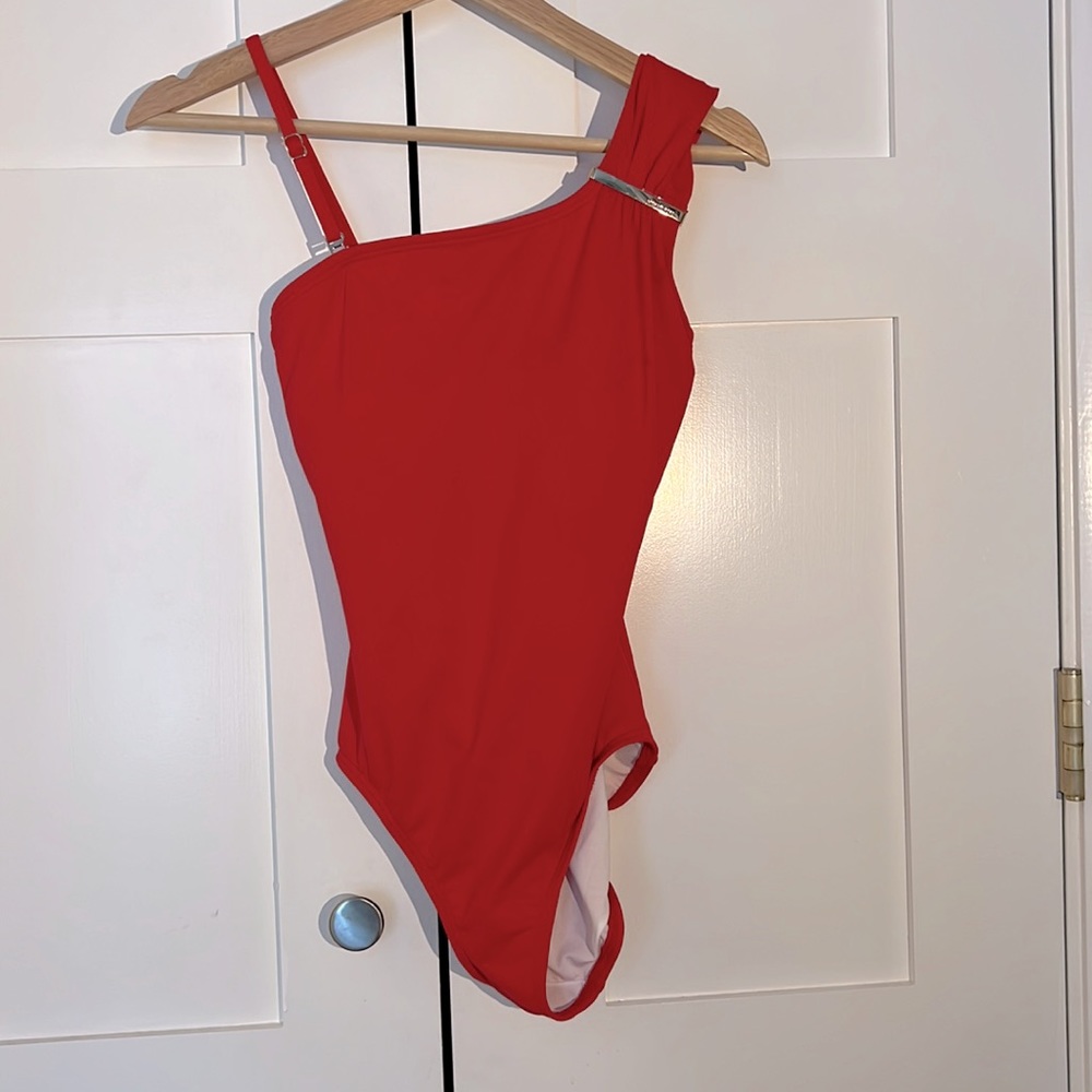 Michael Kors, one piece bathing suit in coral. New without tags.